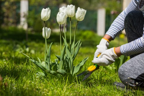Gardener preparing tools at start of shift